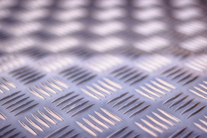 Checker plate (tread plate) surface detail — close-up