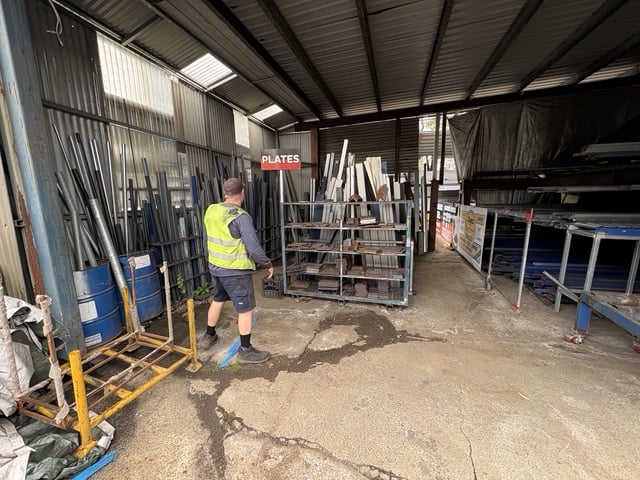 Plates bay at the Marshall Steel yard — sheet and plate stock on the racks